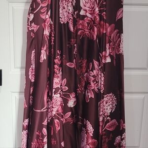Long floral dress with a slit from the knee area.